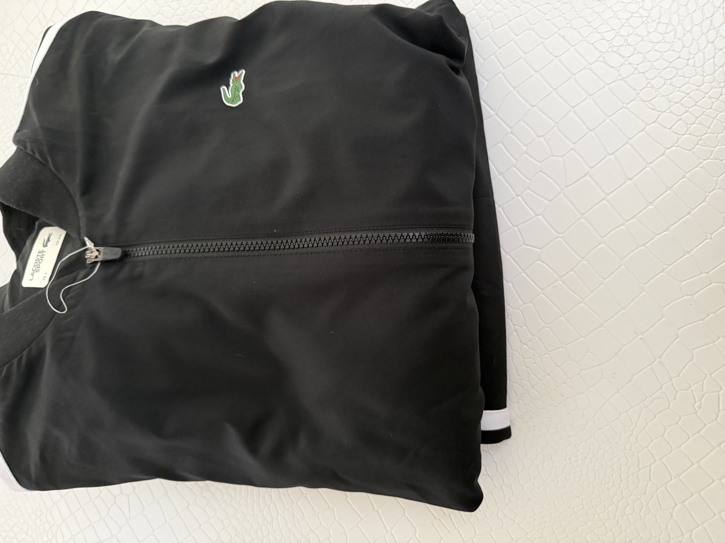 Vends survêtement, Lacoste